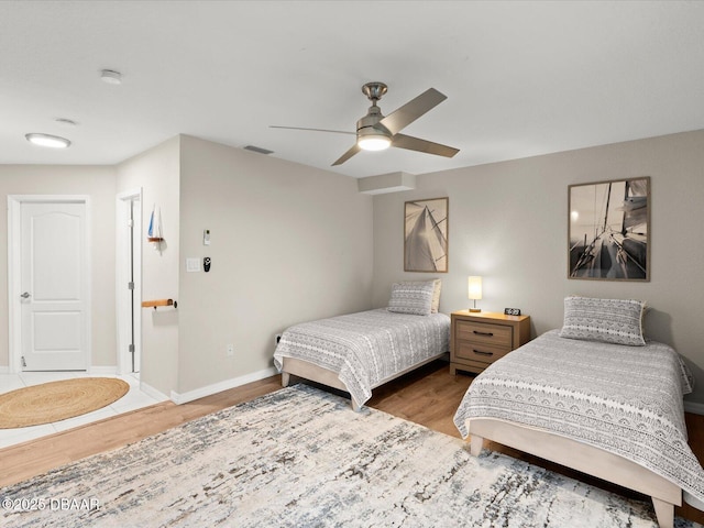 4795 S Atlantic Ave Unit 15, Ponce Inlet, FL 32127 - bedroom featuring wood finished floors and ceiling fan