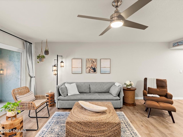 4795 S Atlantic Ave Unit 15, Ponce Inlet, FL 32127 - living area with light wood-type flooring and a ceiling fan