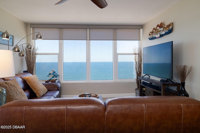 living room featuring a ceiling fan