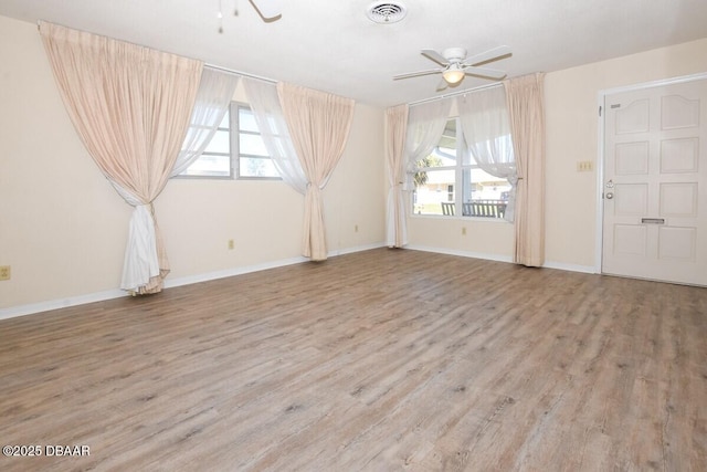 interior space featuring ceiling fan and light hardwood / wood-style flooring