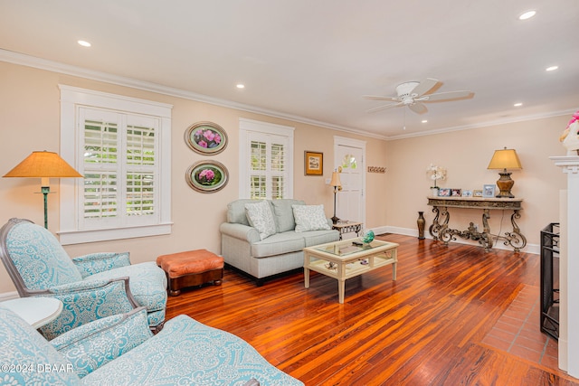 living room with crown molding, ceiling fan, and hardwood / wood-style flooring