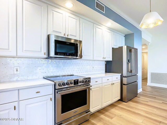 unfurnished living room featuring ornamental molding, light hardwood / wood-style floors, sink, and a textured ceiling