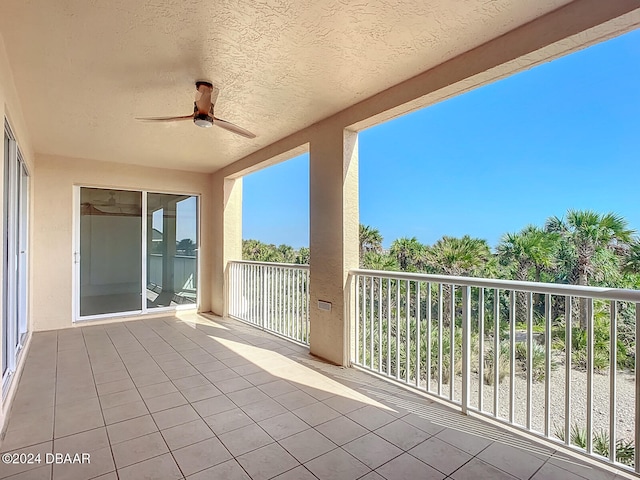 balcony featuring ceiling fan