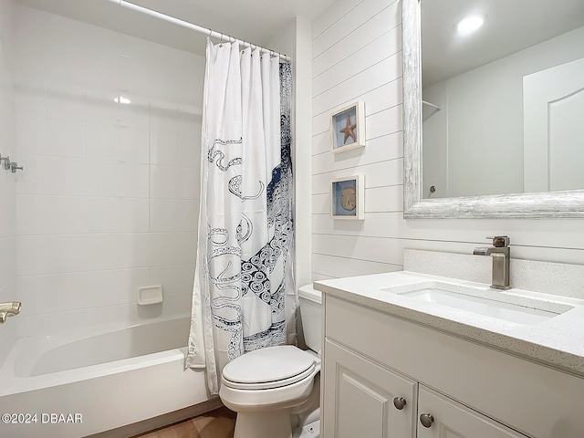 full bathroom featuring vanity, shower / tub combo with curtain, wooden walls, and toilet