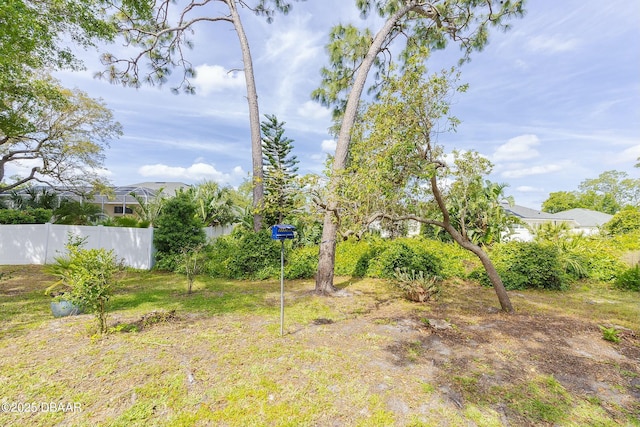 view of yard with fence