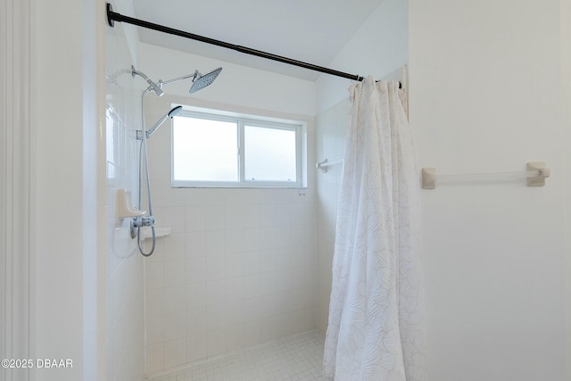 bathroom with a stall shower