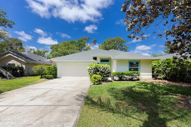 ranch-style home featuring a front lawn, roof with shingles, stucco siding, an attached garage, and driveway