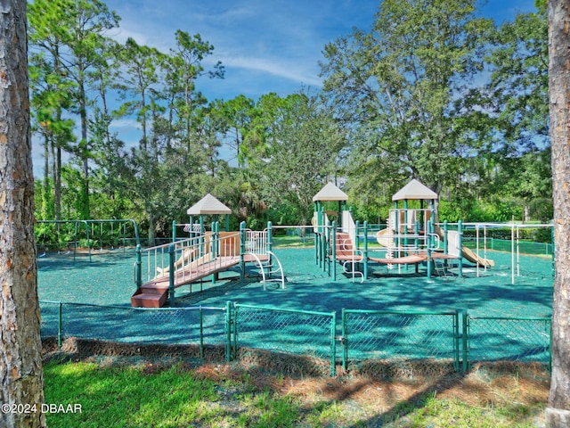 community jungle gym with fence