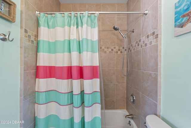 bathroom with shower / bath combination with curtain