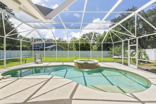 view of pool featuring a patio, glass enclosure, a fenced backyard, a yard, and a pool with connected hot tub