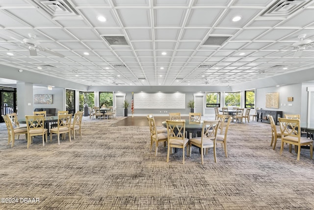 dining space with carpet, a healthy amount of sunlight, visible vents, and recessed lighting