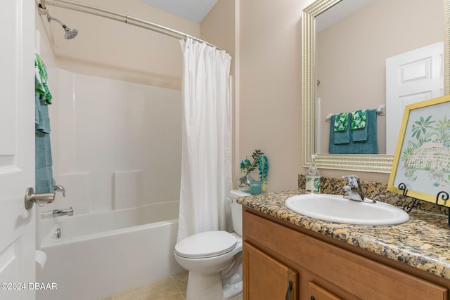 full bathroom with tile patterned flooring, shower / bath combination with curtain, vanity, and toilet