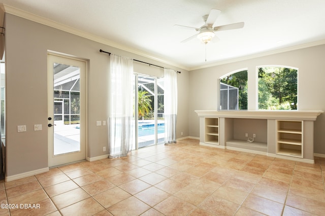 empty room with crown molding, ceiling fan, and light tile patterned flooring