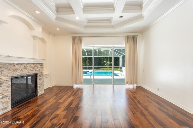 unfurnished living room with crown molding, plenty of natural light, and light tile patterned flooring