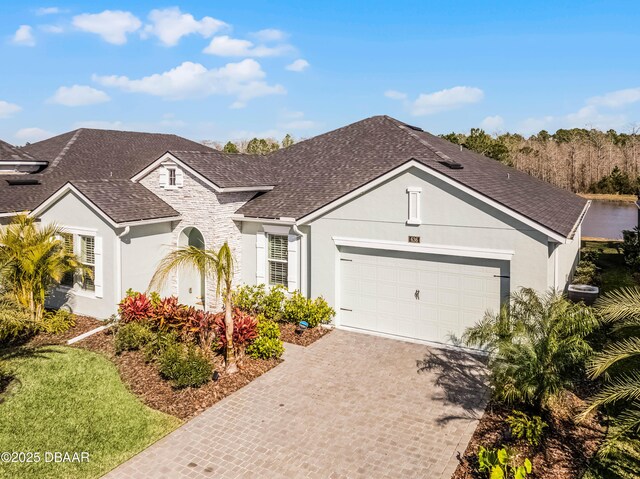 ranch-style home with a garage