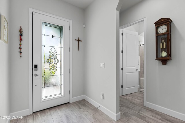 hallway with light wood-type flooring