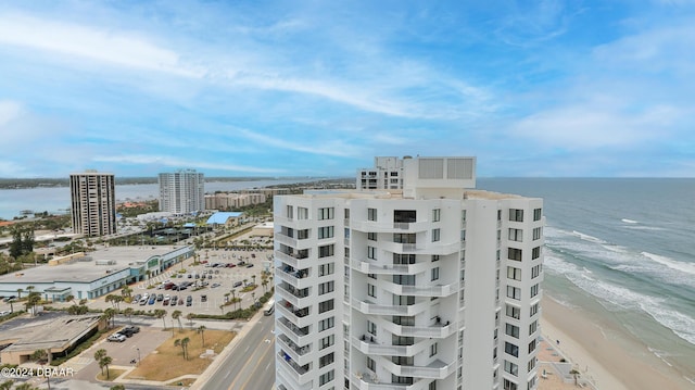 view of property featuring a view of city and a water view