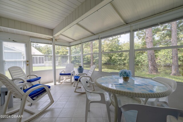 sunroom / solarium with lofted ceiling