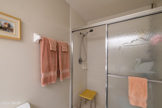 bathroom with an enclosed shower