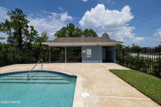 view of swimming pool featuring a patio