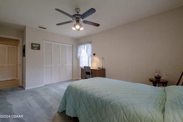 bedroom featuring a closet, ceiling fan, and carpet floors