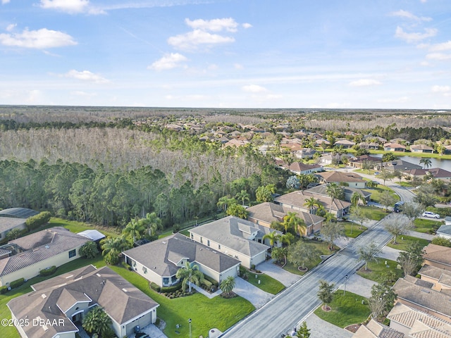 bird's eye view with a residential view and a forest view