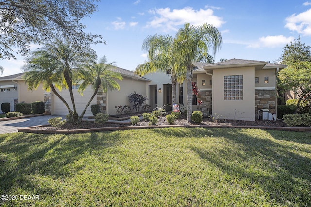 view of front of home featuring an attached garage, stone siding, decorative driveway, stucco siding, and a front yard