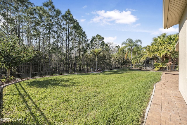 view of yard with a fenced backyard