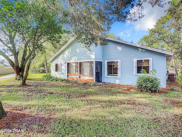 exterior space with a front yard