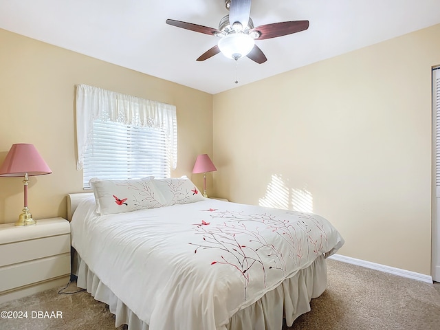 bedroom with light carpet and ceiling fan