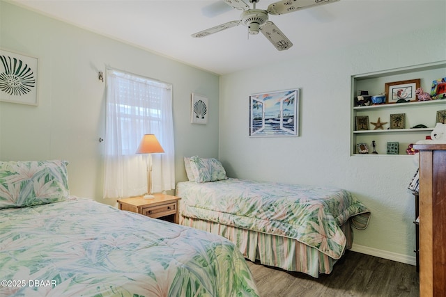 bedroom with hardwood / wood-style flooring and ceiling fan