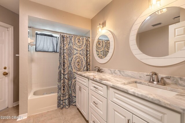 3931 Tano Dr, Ormond Beach, FL 32174 - full bath with double vanity, shower / bathtub combination with curtain, and tile patterned floors