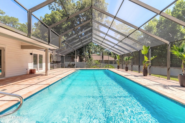 3931 Tano Dr, Ormond Beach, FL 32174 - view of pool featuring a patio area, french doors, and glass enclosure
