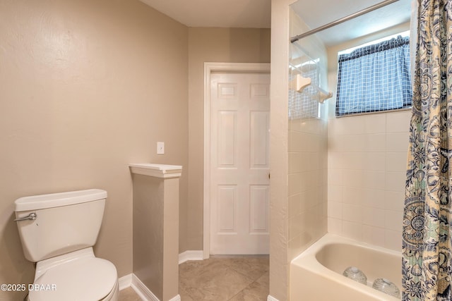 3931 Tano Dr, Ormond Beach, FL 32174 - bathroom featuring shower / bath combination with curtain, toilet, tile patterned floors, and baseboards