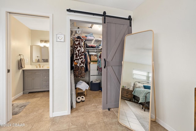 interior space with tile patterned flooring and vanity