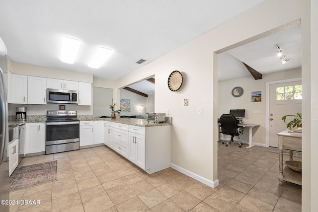 kitchen featuring light stone countertops, white cabinetry, lofted ceiling with beams, light tile patterned floors, and appliances with stainless steel finishes