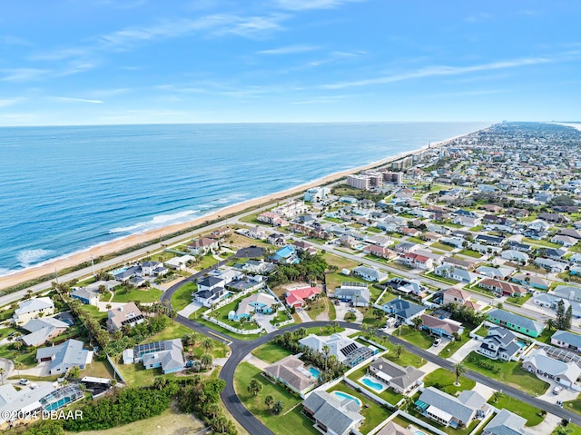 aerial view featuring a beach view and a water view