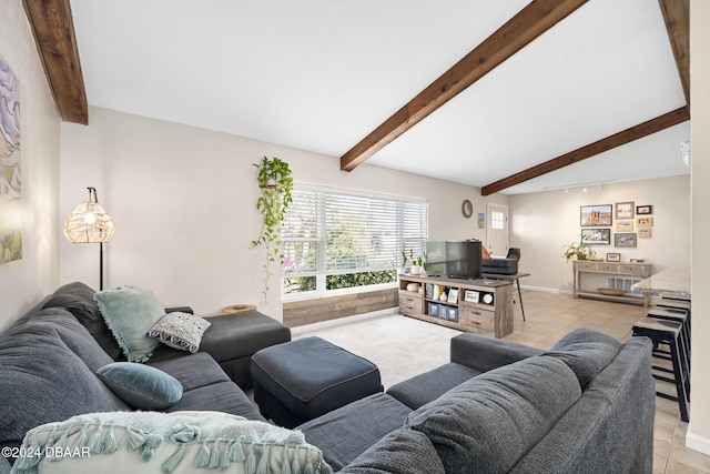 tiled living room featuring beamed ceiling