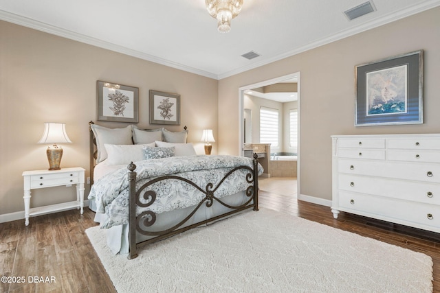 bedroom with dark hardwood / wood-style flooring and ornamental molding