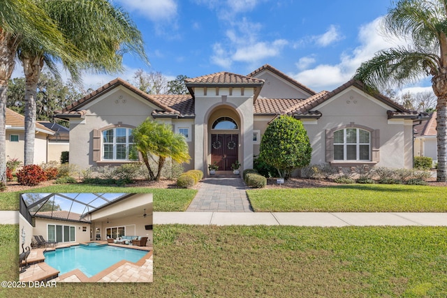 mediterranean / spanish-style home with glass enclosure and a front lawn