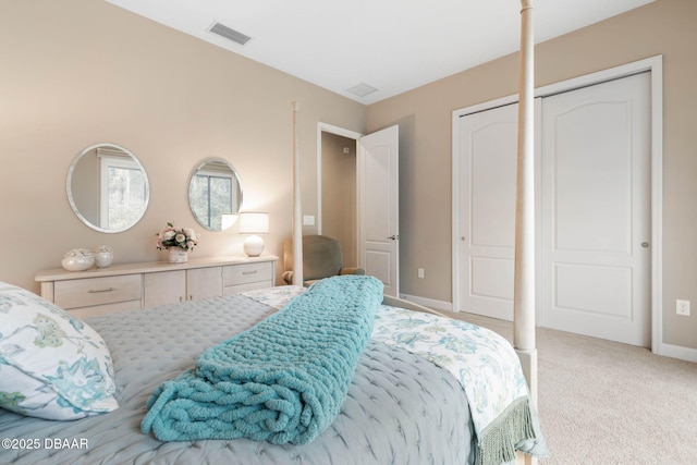 bedroom featuring light carpet