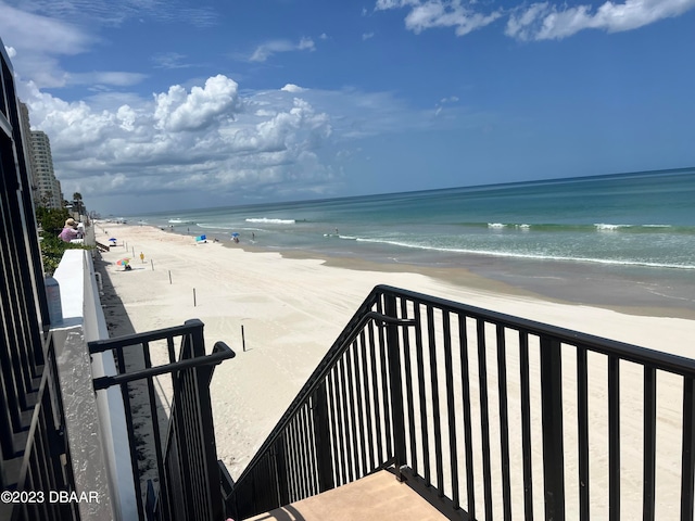 property view of water featuring a beach view