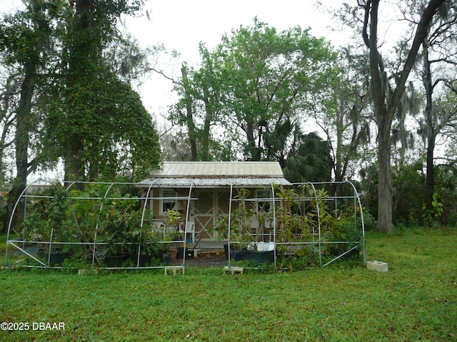 view of community with a yard