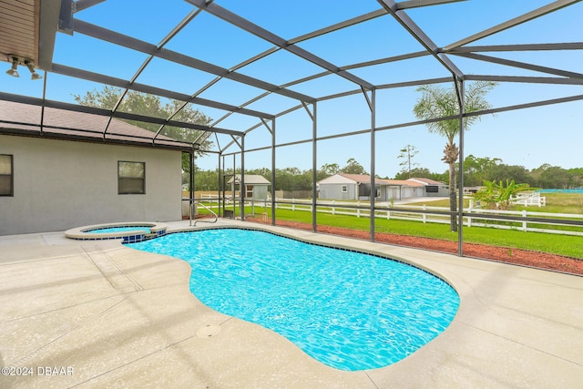 540 Leeway Trl, Ormond Beach, FL 32174 - view of swimming pool featuring a patio, glass enclosure, and a pool with connected hot tub