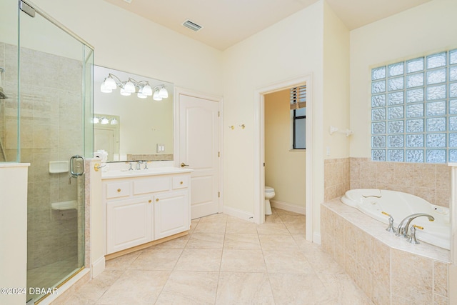 540 Leeway Trl, Ormond Beach, FL 32174 - bathroom with a garden tub, vanity, a stall shower, and tile patterned flooring