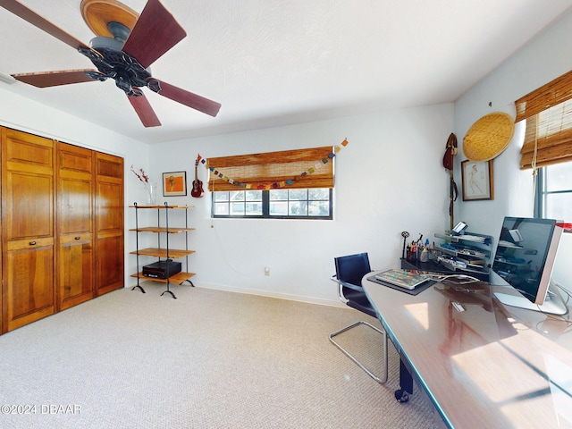 office with ceiling fan and light colored carpet