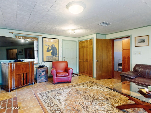 living room featuring light tile patterned floors