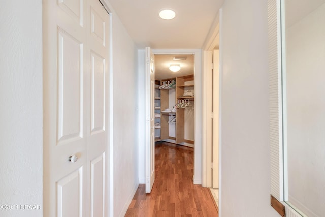 hallway featuring light hardwood / wood-style flooring