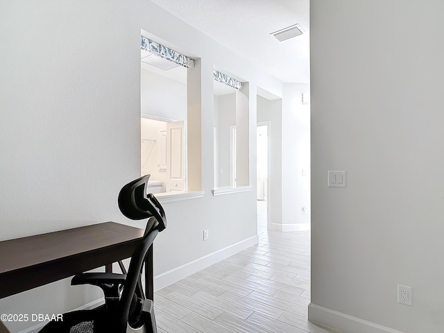 home office featuring light hardwood / wood-style flooring