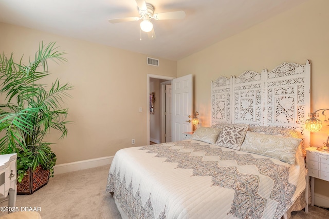 bedroom with light carpet, baseboards, visible vents, and a ceiling fan